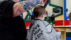 Raiders and local businesses provide free haircuts & beautician services for back to school