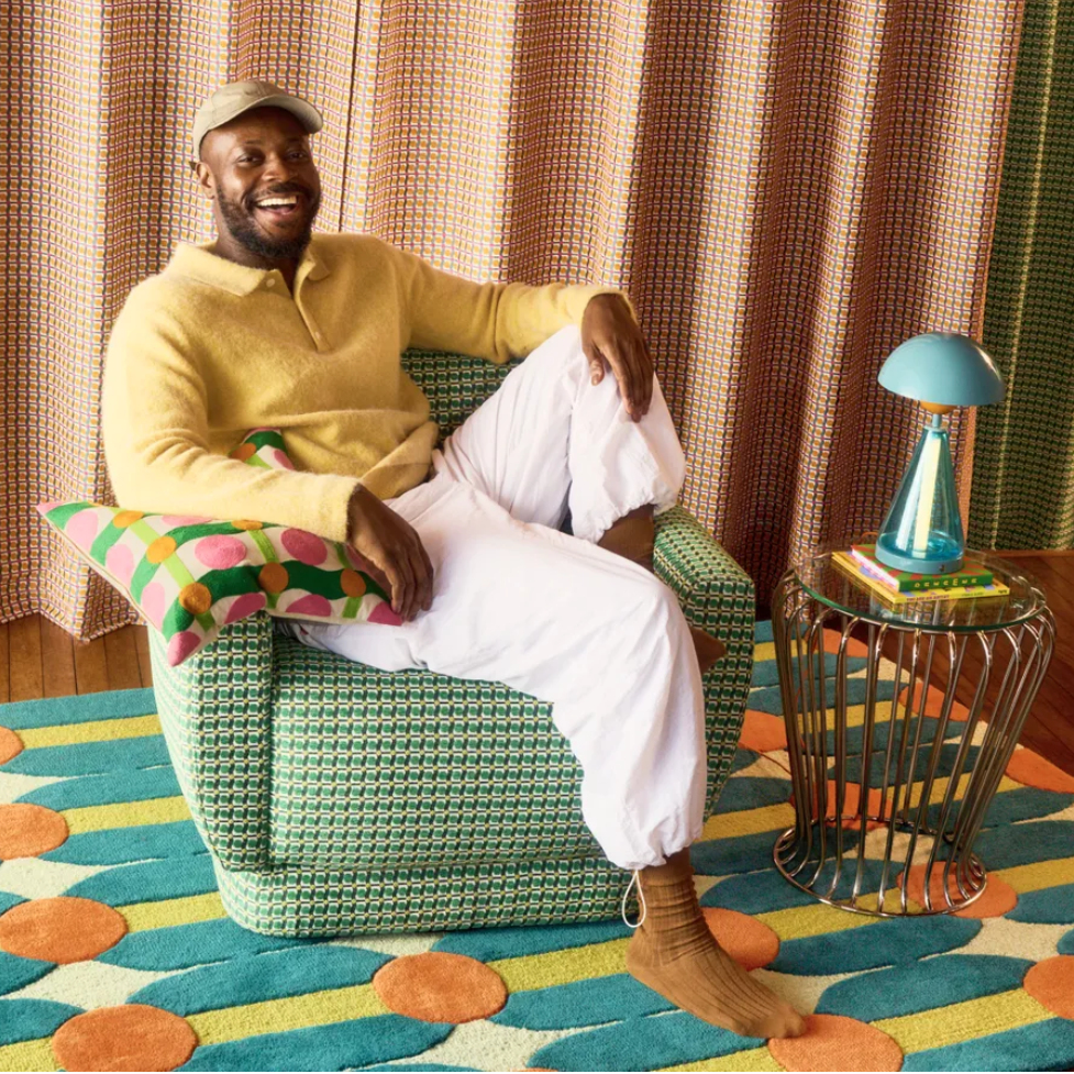male model in jumper with oversized brooch