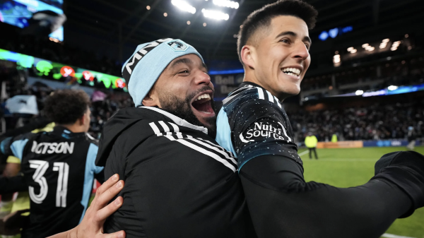 Joaquin Pereyra and DJ Taylor celebrate postgame
