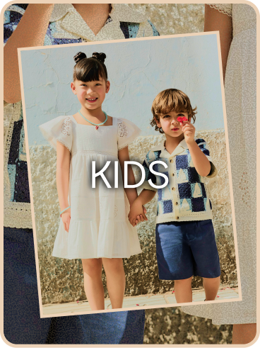 Young girl wearing white dress and young boy where checkered shirt and blue shorts