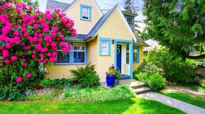 Home painted yellow with blue trim