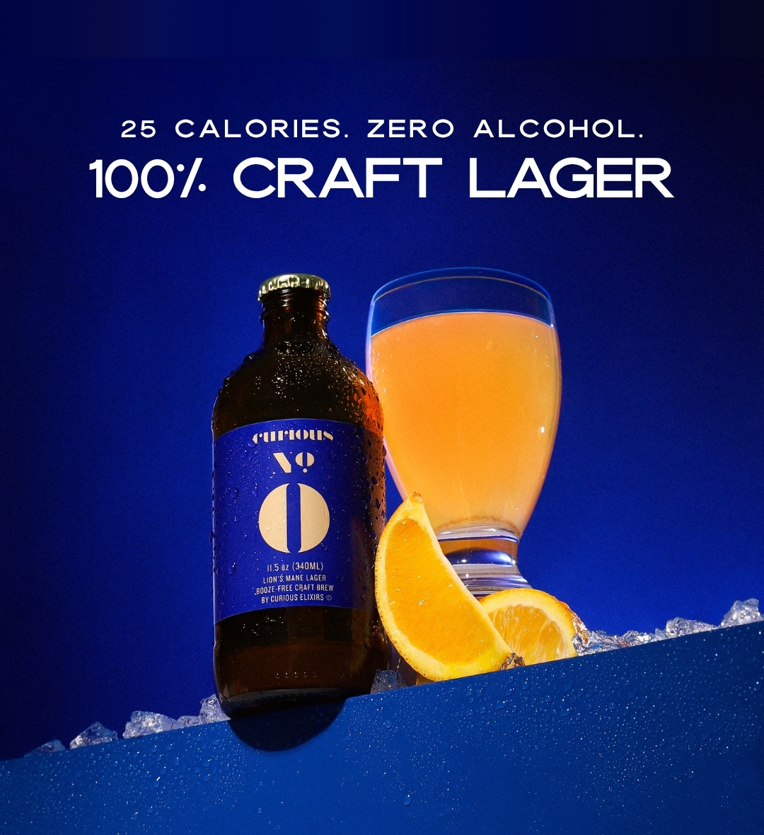 A bottle of Curious Zero next to a poured pint glass with orange slices 