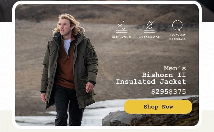 Photo of a man wearing the Bishorn II Insulated Jacket while hiking on a volcano. Shop Now.