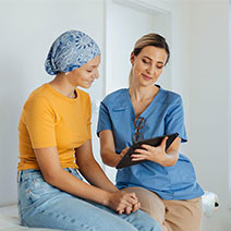 Oncology patient talking with doctor
