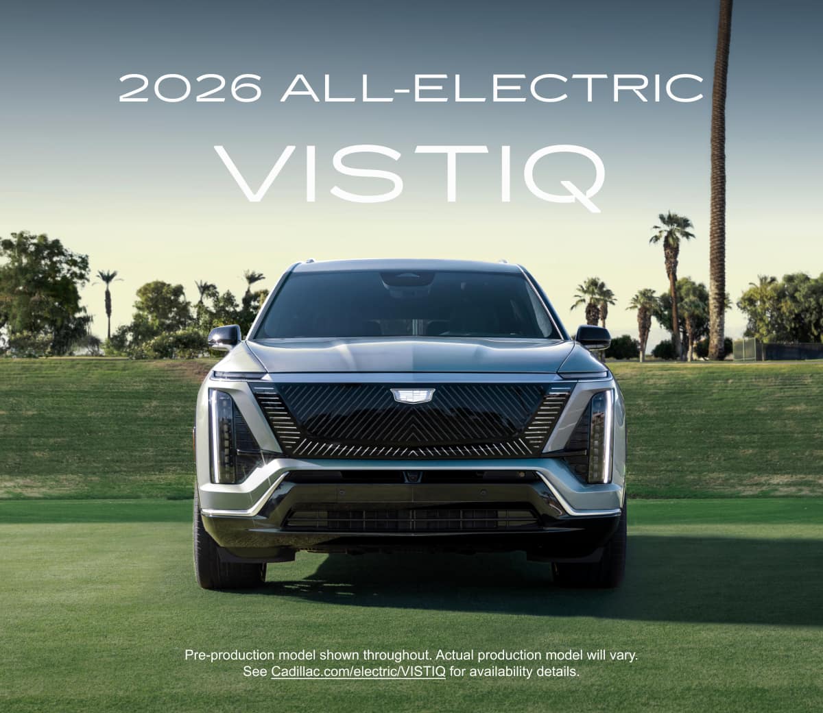 Front view of the 2026 VISTIQ mid-size electric SUV parked on a grassy tennis court with the title 2026 all-electric VISTIQ