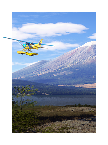 Art for Microsoft Flight Simulator Update 20 depicting a float plane soars over a lake near Mt. Fuji.