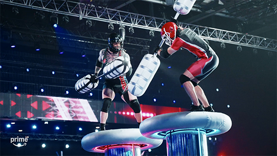Two men jousting.