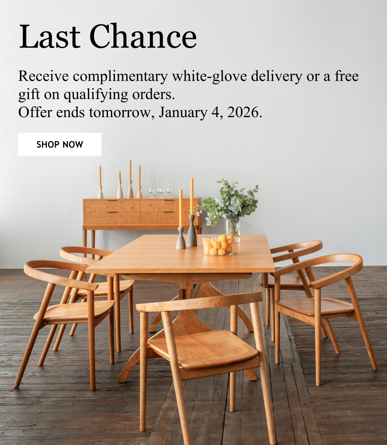 Dining set featuring the Wishbone table, Cumberland Chairs and Cumberland Sideboard