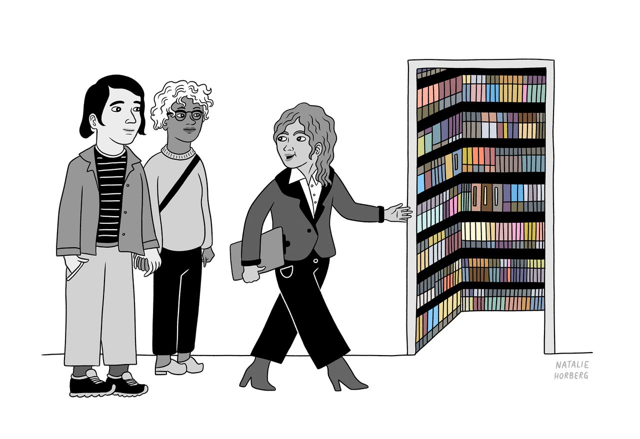 A person giving a tour of an apartment that has a criterion closet.