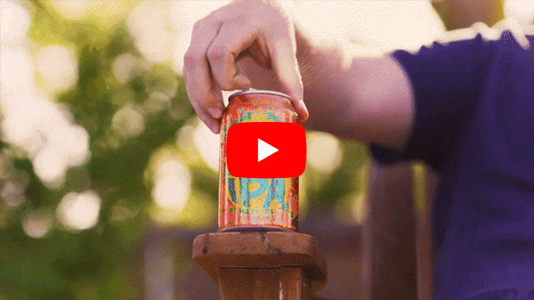 Looping video: Opening a can of Peachy Little Thing and pouring it into a glass