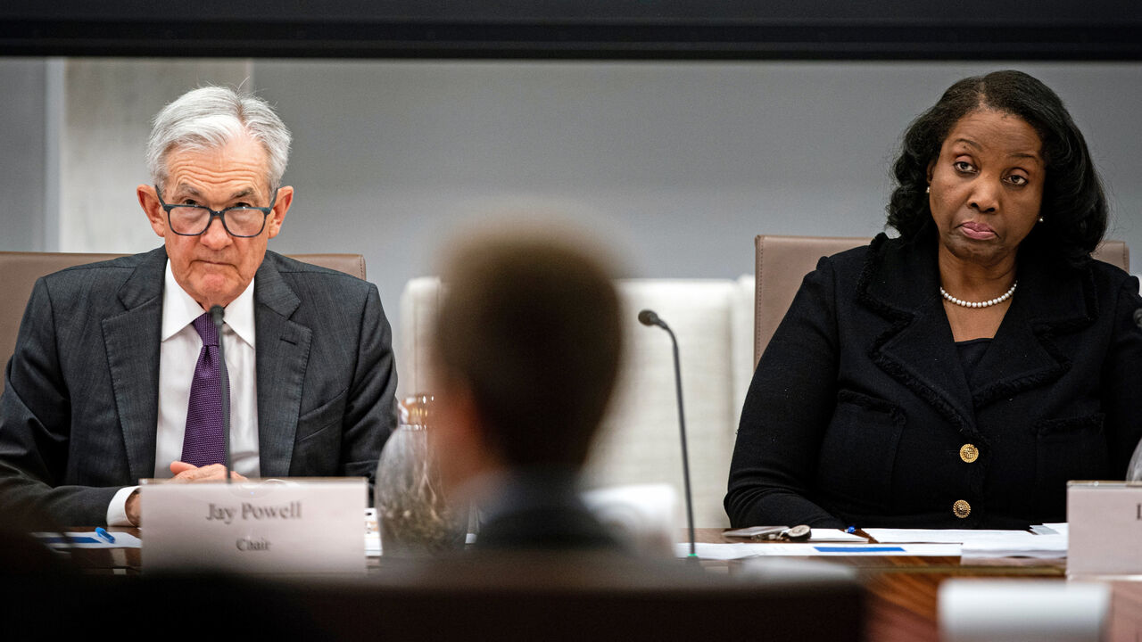 Jerome Powell, chairman of the US Federal Reserve, left, and Lisa Cook, governor of the US Federal Reserve.