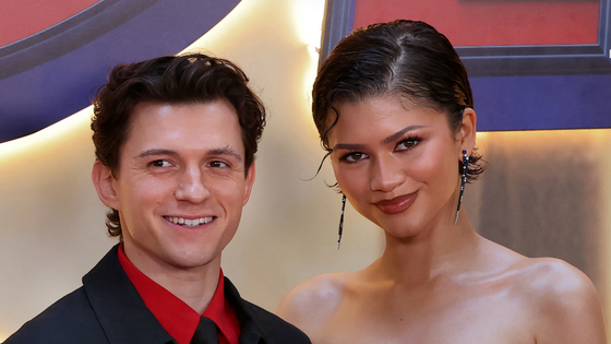 Tom Holland and Zendaya pose at a Spider-Man: Brand New Day event | Thomas Coex/AFP via Getty Images