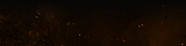 Sparks rise in the darkness.