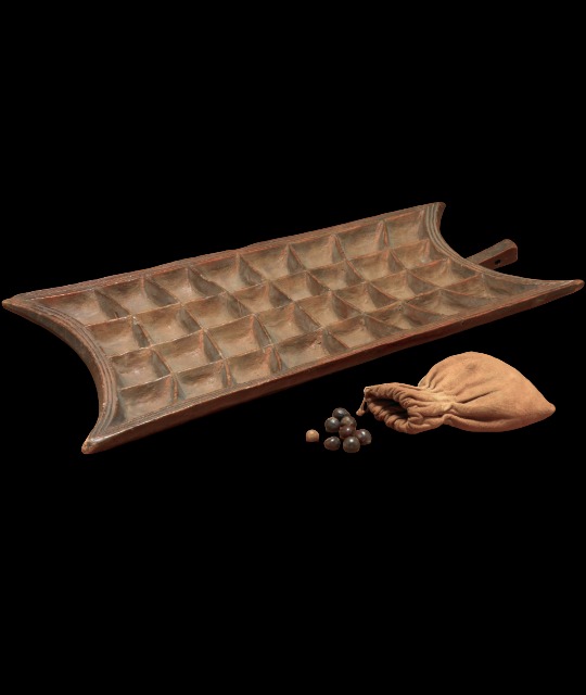 Mancala board made of wood.