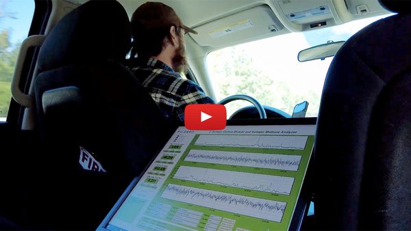 man drives car with screen that shows 