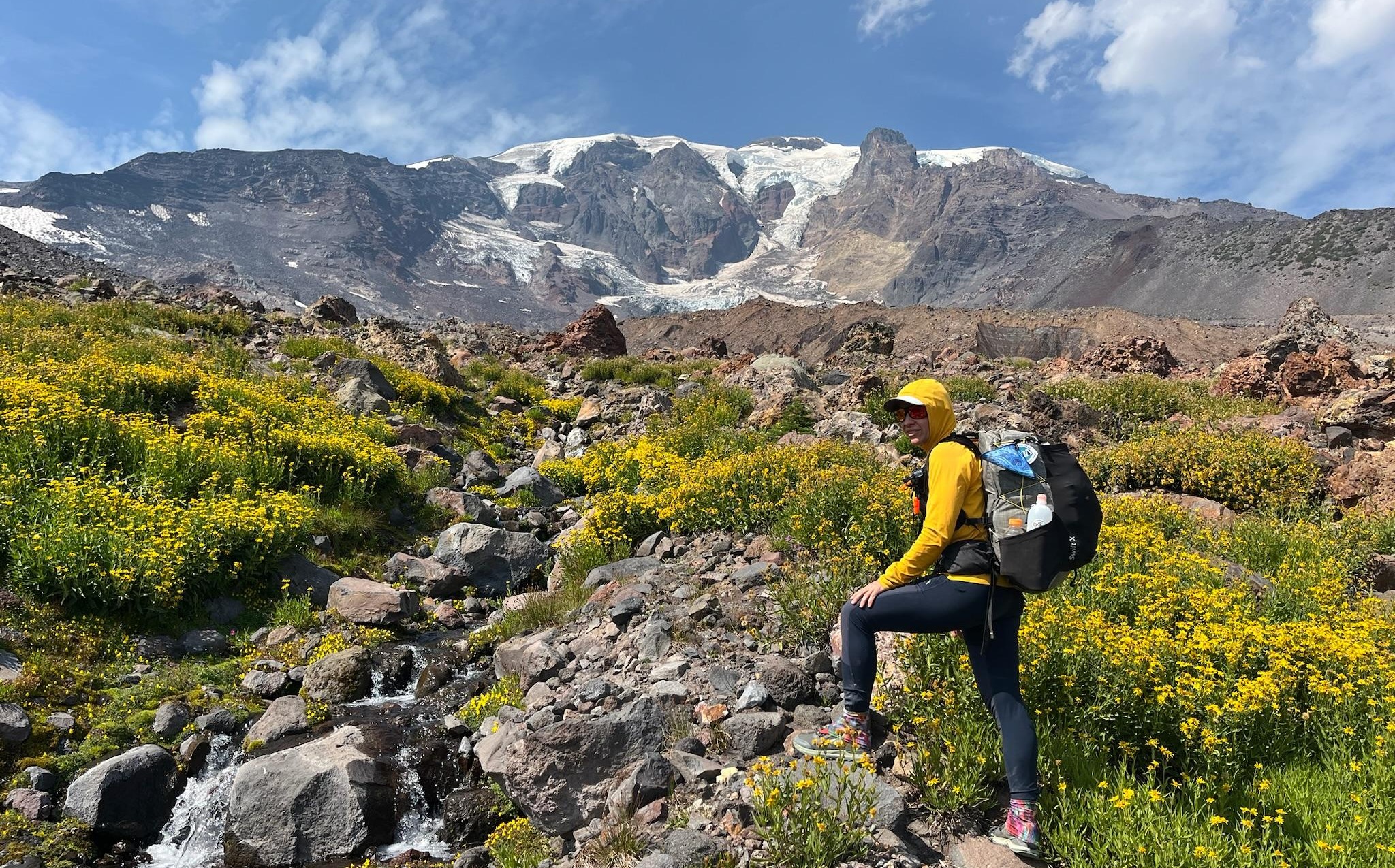 women in flowers on mountain