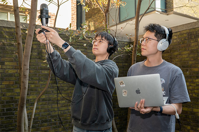 As a test, Yiduo Hao (left) recorded the sounds of spring in Philadelphia, then used SmartDJ to transform them into the sounds of a forest. (Image: Sylvia Zhang)