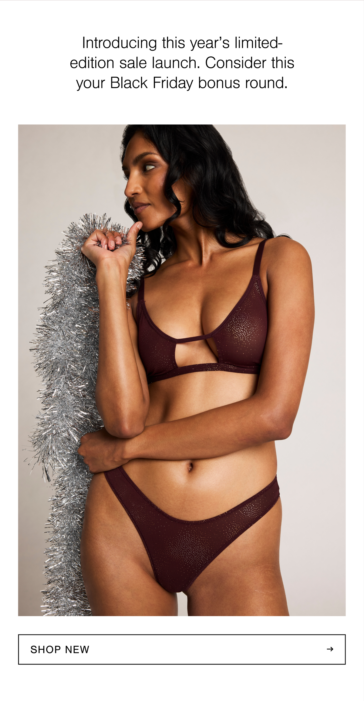 Close-up of Sieve Cutout Bra and Dipped Thong in Garnet Spark with silver tinsel. Shop new. 