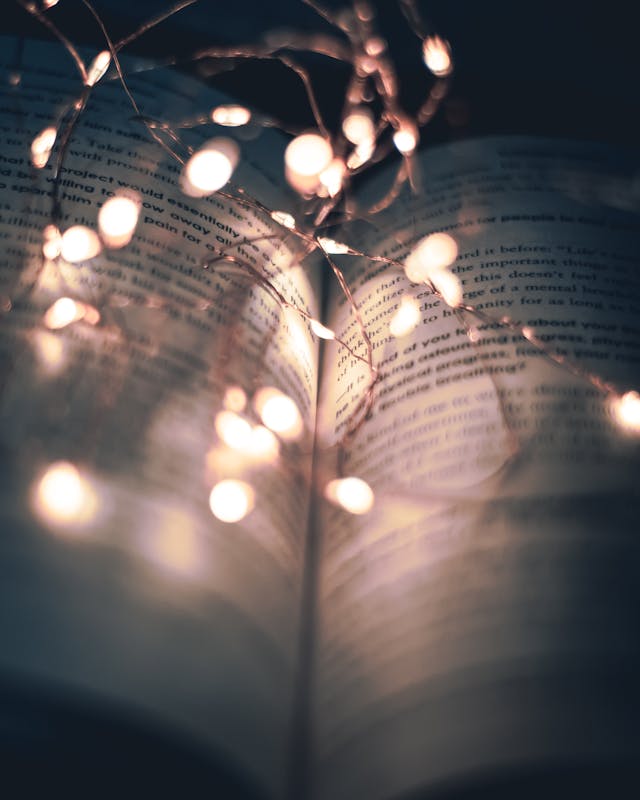 String lights on an open book