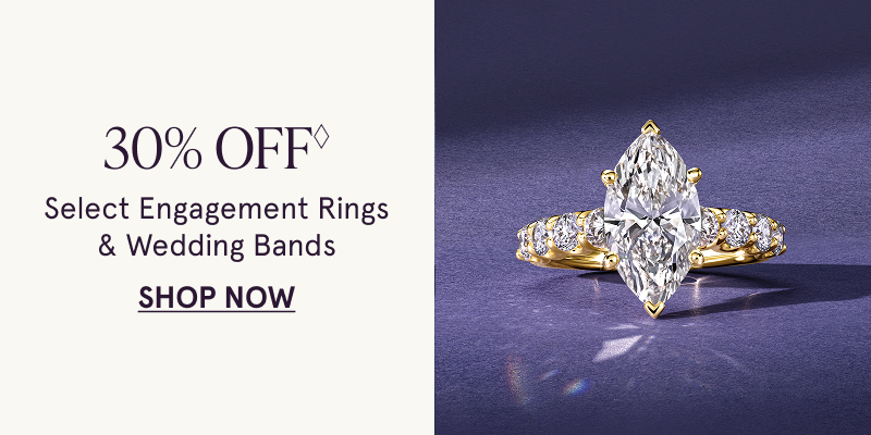 Gold-set marquise-cut stone diamond ring with eternity band. 30% OFF Select Engagement Rings & Wedding Bands. Click here to shop now