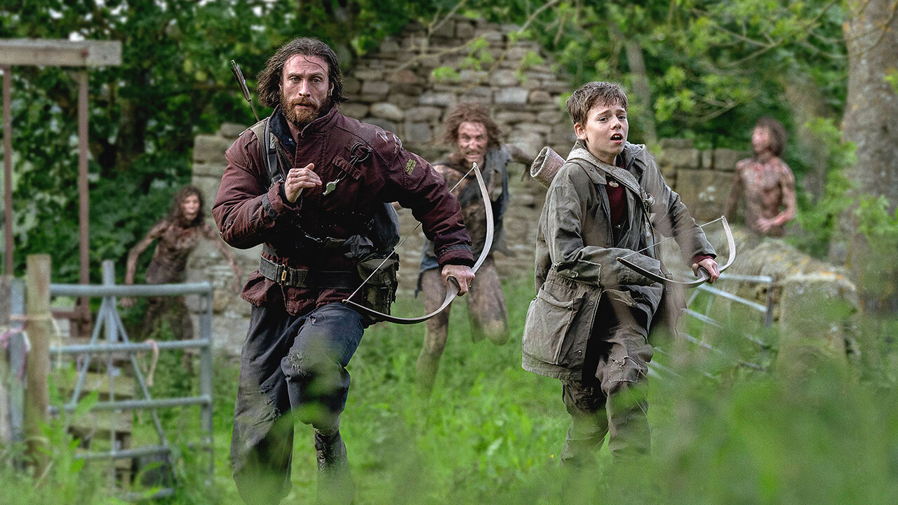 Aaron Taylor-Johnson and Alfie Williams in a scene from “28 Years Later.” 