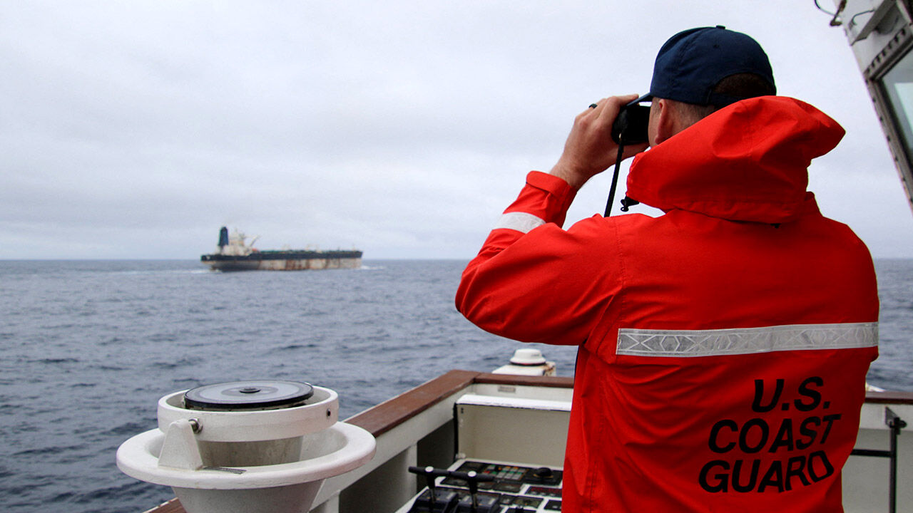 A handout photo shows the US European Commannd watching the M/V Bella 1 oil tanker in the Atlantic Ocean