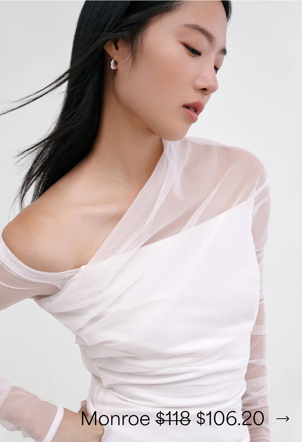 Profile close-up of Xun in The Monroe Top.