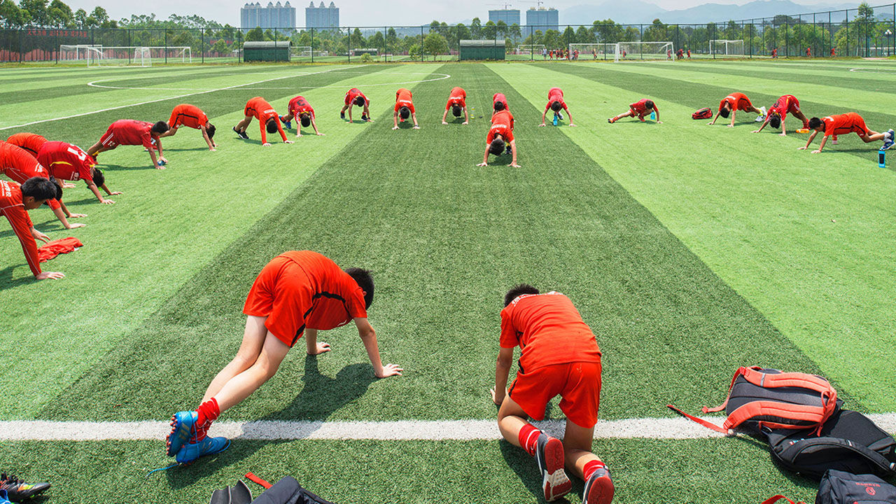 Students during a training session at a full-time boarding primary and secondary football school.