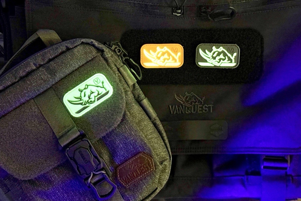 $1M rhino patch on VARG sling bag and ENVOY messenger bag