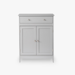A white cabinet on a gray tile