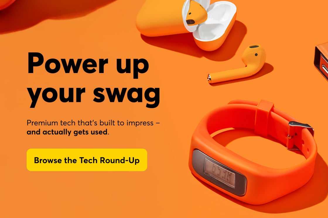 Orange custom earbuds and a step counter, with the text "Power up your swag" and a yellow button that says "Browse the Tech Round-Up."