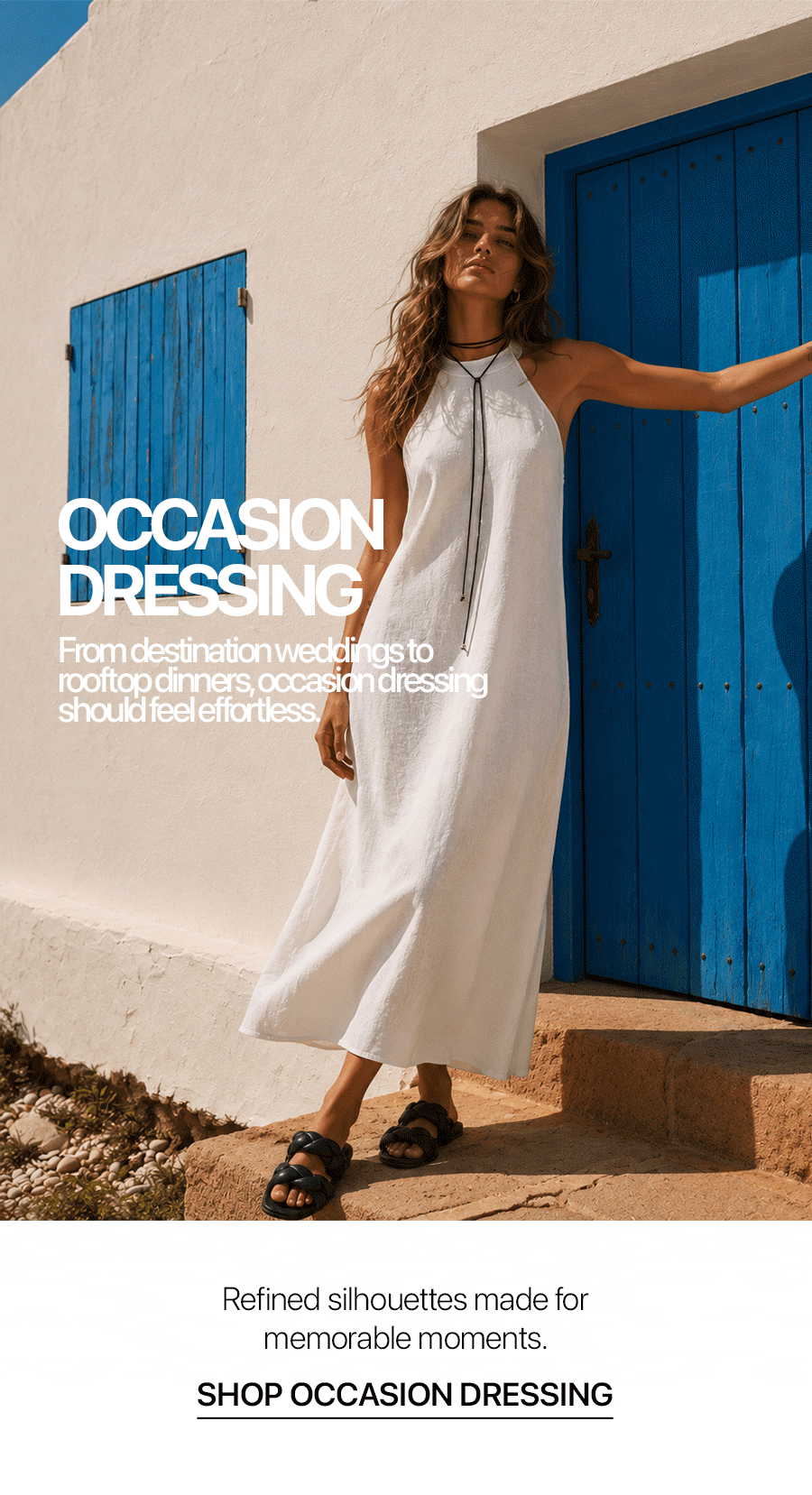 a woman standing in front of a blue door