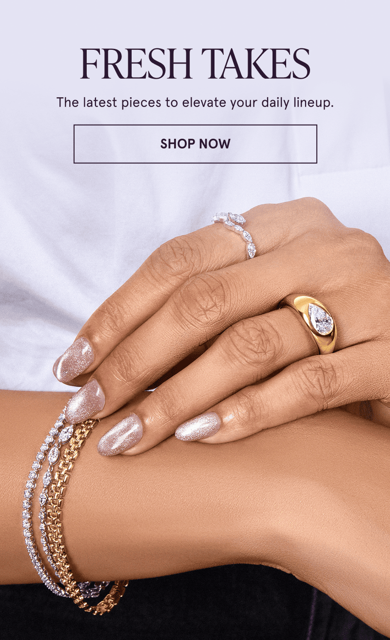 A model wearing gold, white metal and diamond jewelry. The latest pieces to elevate your daily lineup. Click here to shop now