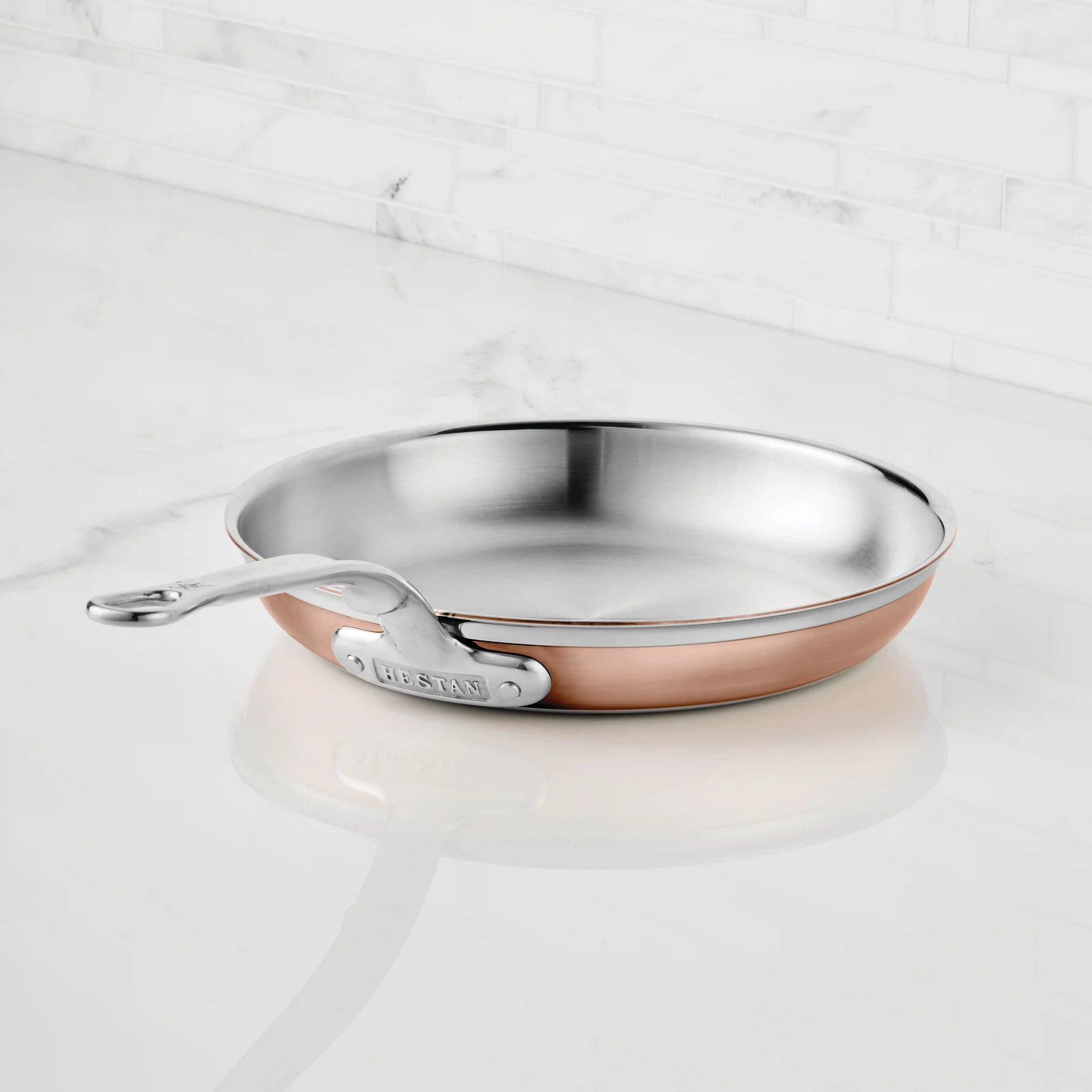 IMG: Copper Induction skillet on marble countertop