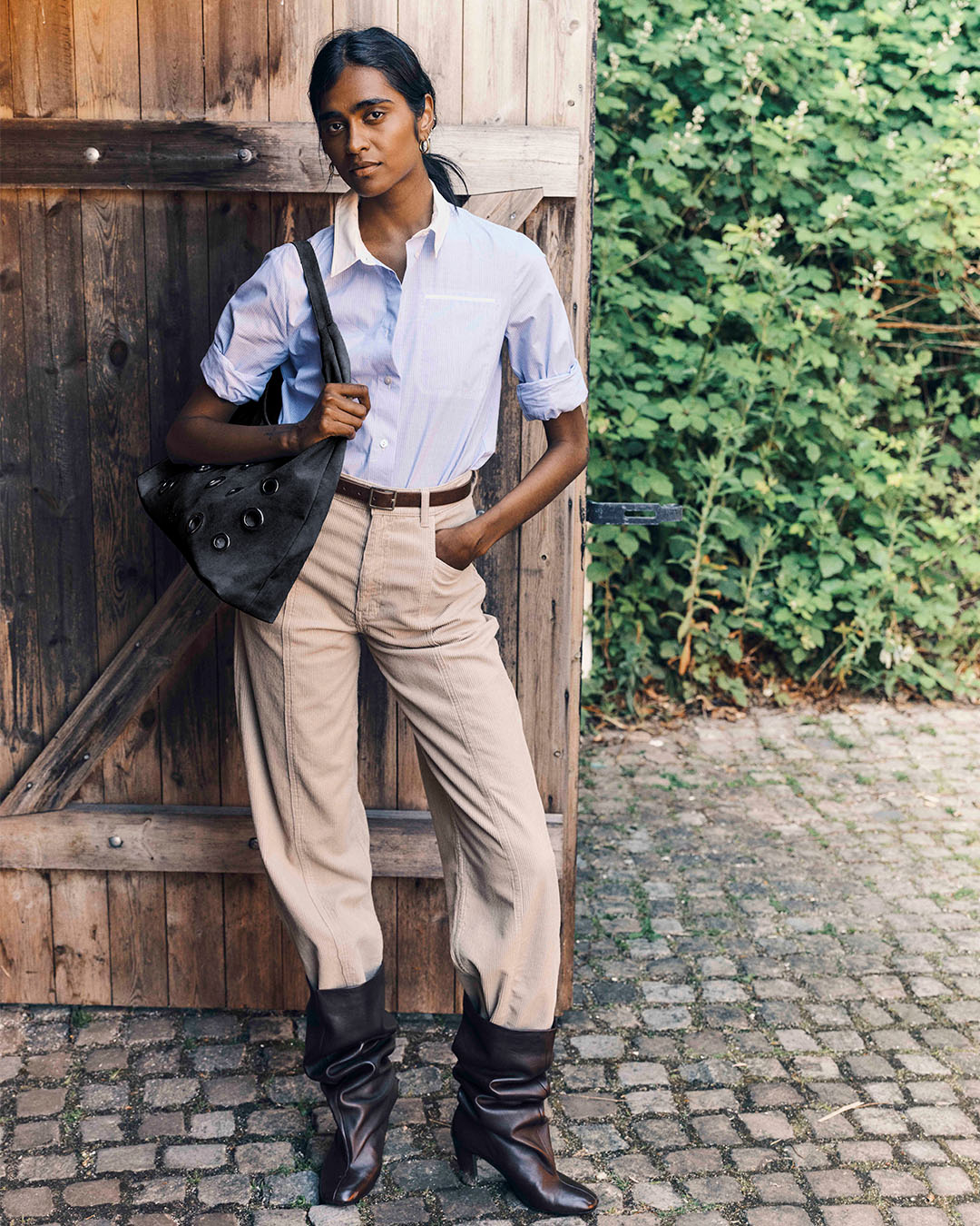 Beige jeans and blue shirt