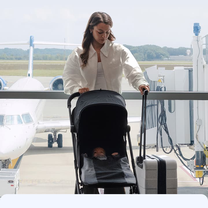 Women pushing stroller and luggage 