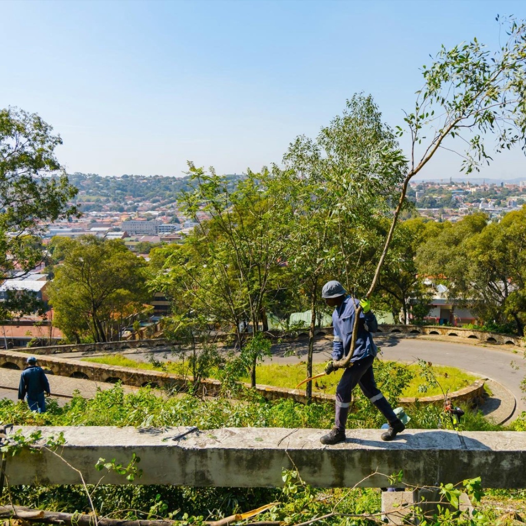 Person walking on a concrete ledge