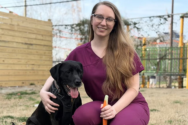 Alison Kowalski with her dog, Kona.