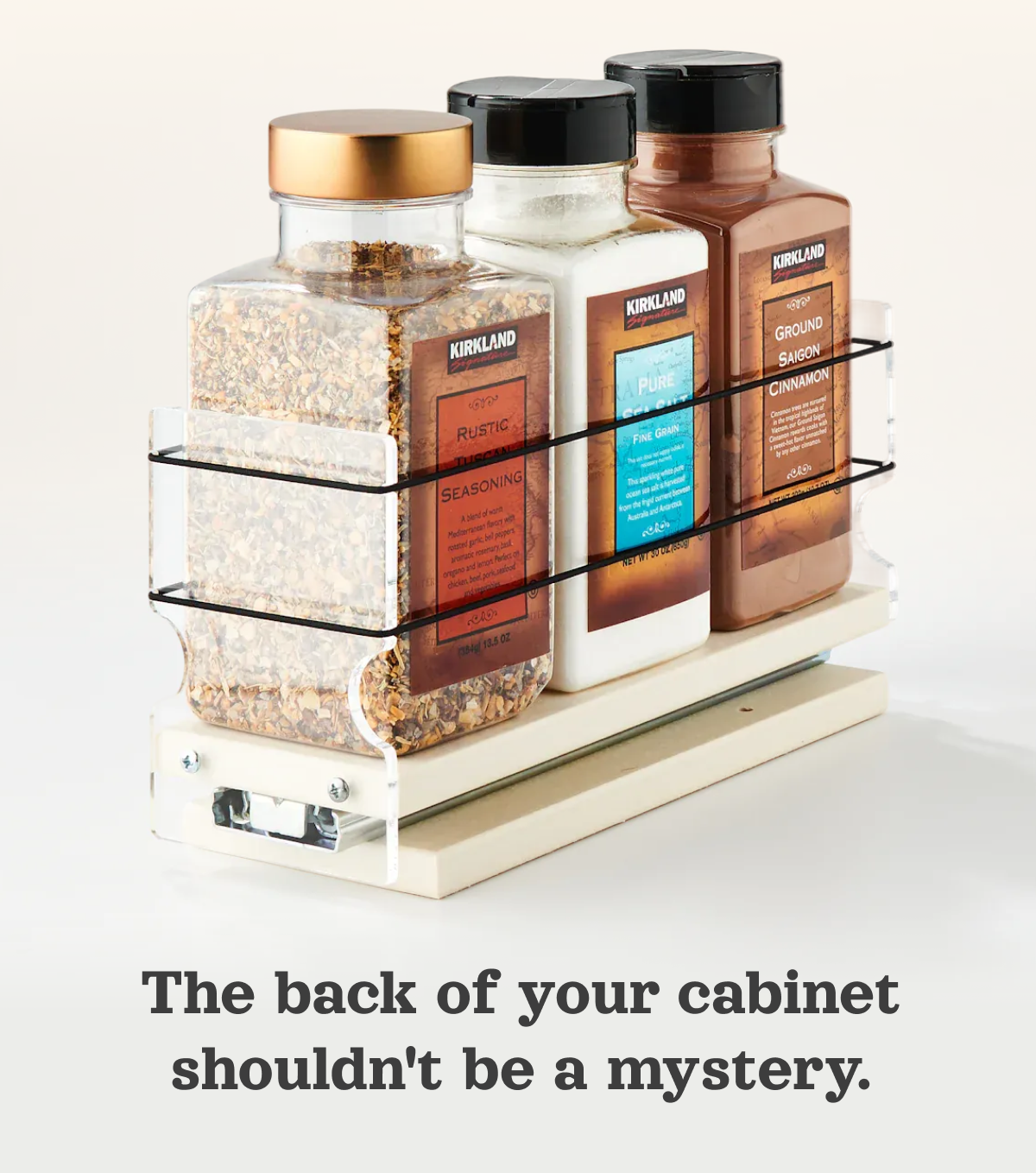 Vertical Spice sliding spice rack drawer holding three spice containers, shown from the side on a clean background.