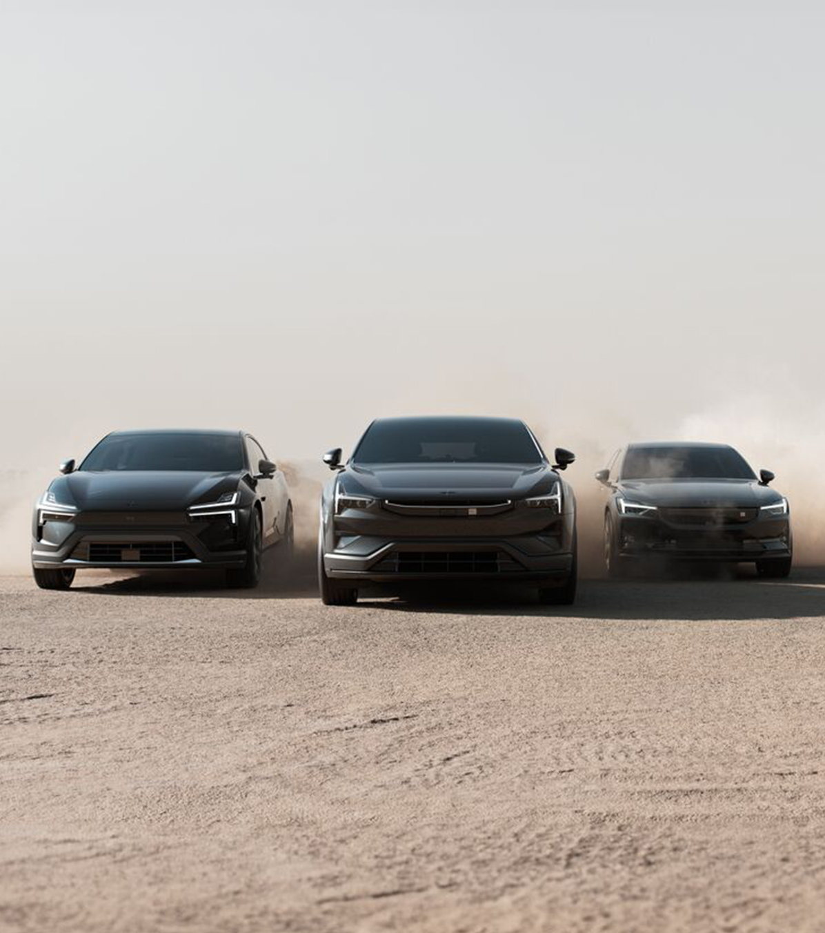 Lineup of Polestar cars. Polestar 2, Polestar 3 and Polestar 4 driving in California desert.
