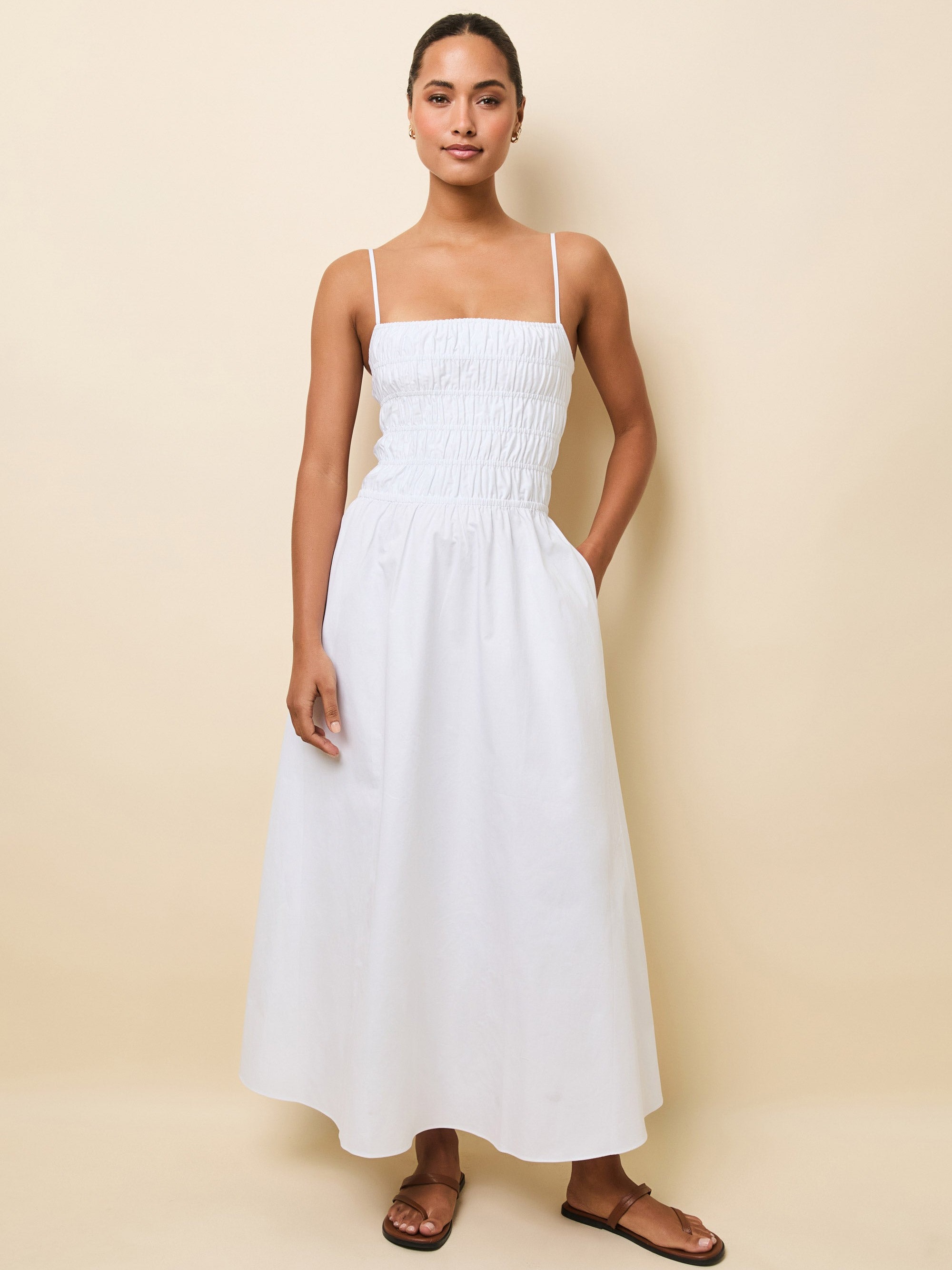 Woman wearing white midi dress