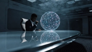 man in suit sits at table next to glowing ball