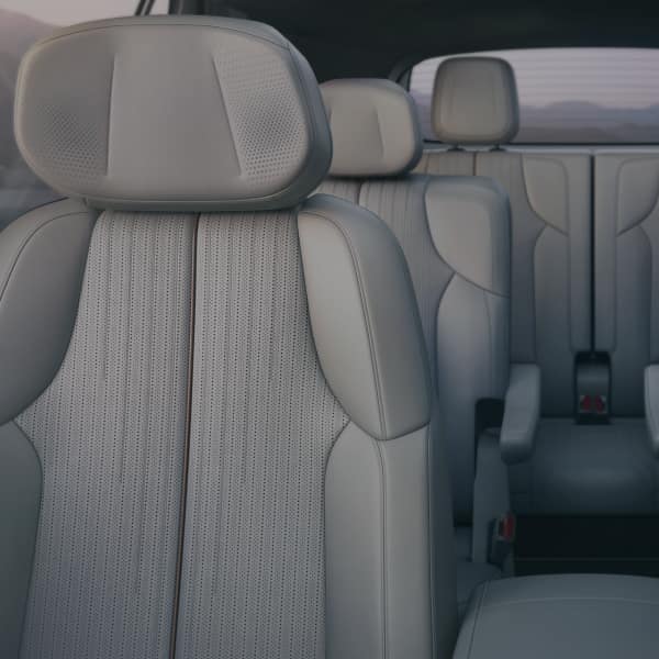 Front view of the 2026 Cadillac VISTIQ’s passenger, second, and third row seats.