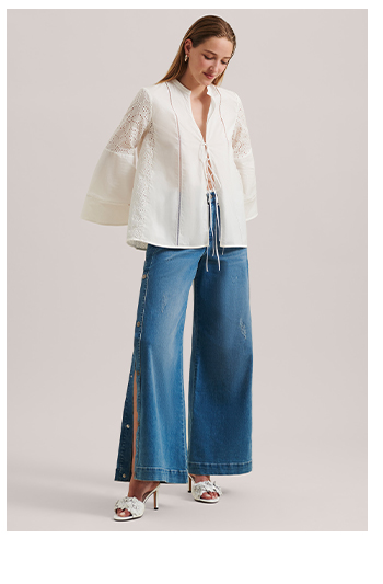 WHITE LONG SLEEVE PEASANT INSPIRED BLOUSE WITH TIE FRONT