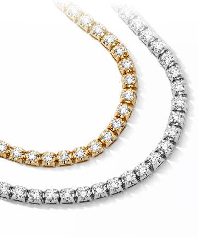 Two Diamond Tennis Necklaces, one is Yellow Gold and the Other is White Gold. 