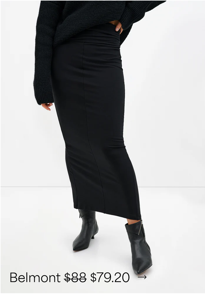 Maritza wears The Belmont Skirt with a chunky sweater and pointed ankle boots.