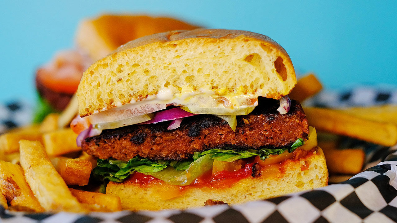 A veggie burger made from marinated soy, beets and ground mushrooms 