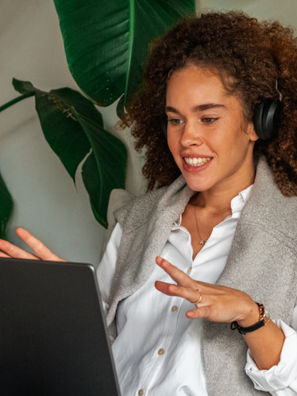 Photo-of-woman-talking-during-a-video-call-on-tablet