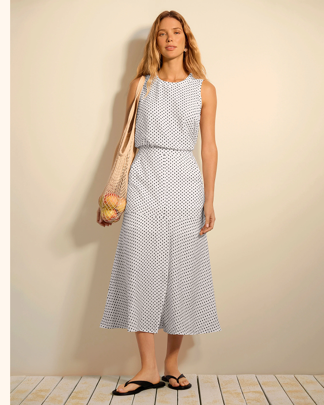 Playful yet polished, the Spot On Skirt features a timeless polka-dot print and easy crinkle texture. Pair it with the matching top for a chic coordinated look.