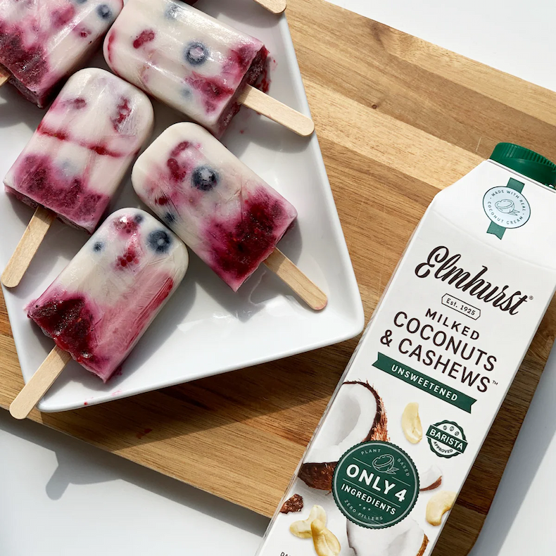 Red, White & Blueberry Popsicles made with mixed berries and Unsweetened Coconut & Cashew Plant Milk